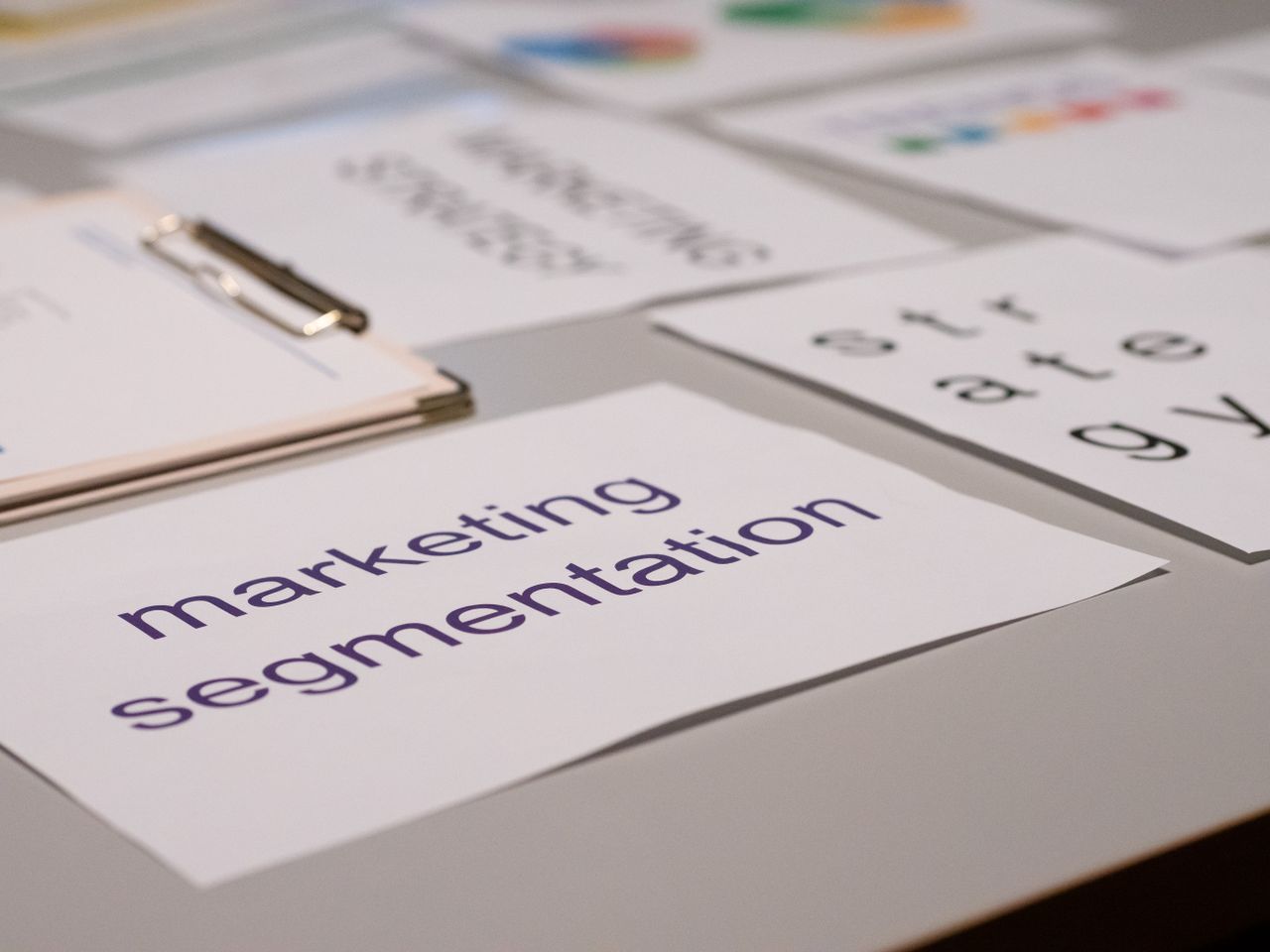 home-hero Close-up of various marketing documents on a desk, perfect for business and strategy discussions.